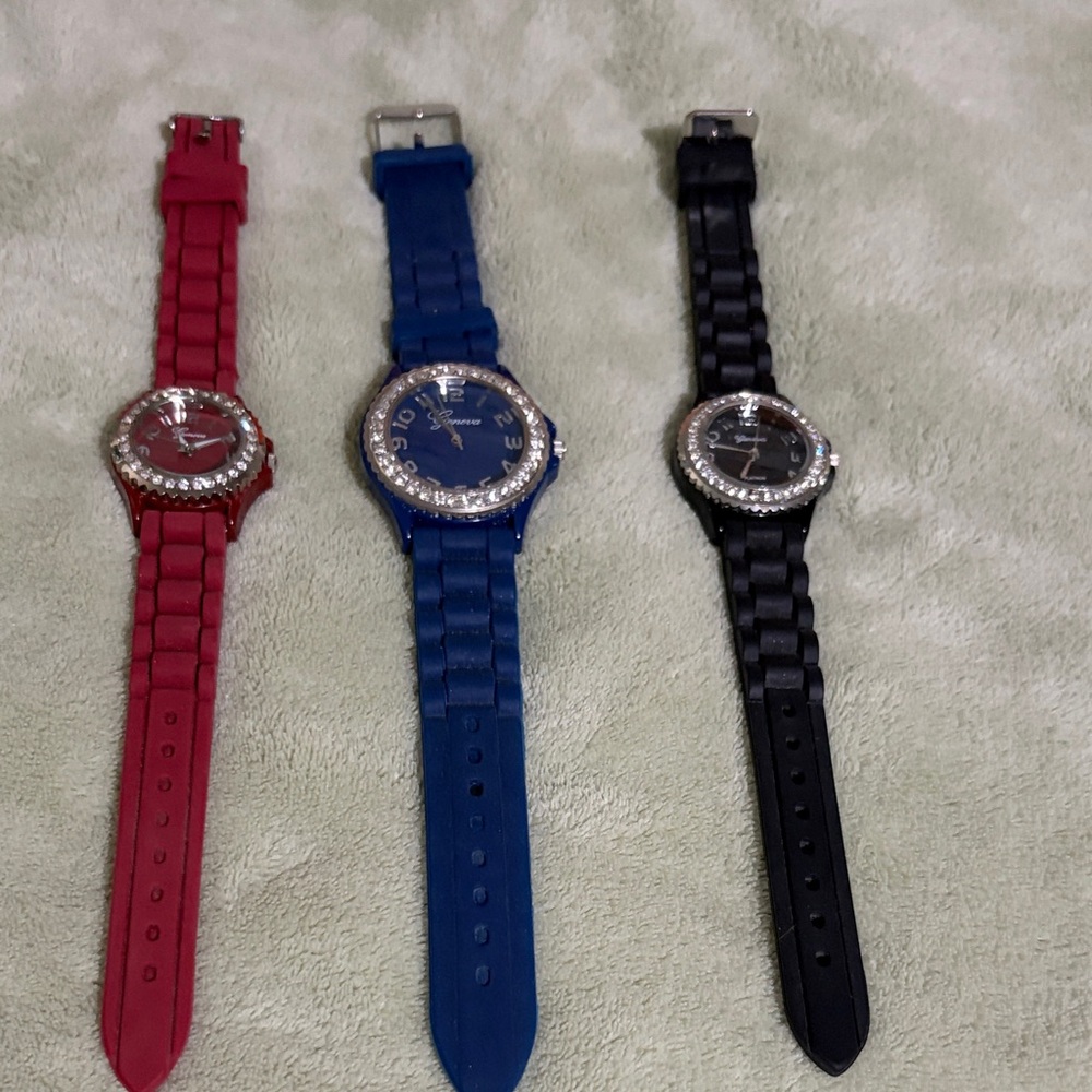 Set of Three Stylish Watches in Red, Blue, and Black

Needs  new batteries